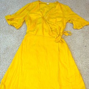Yellow cross body dress